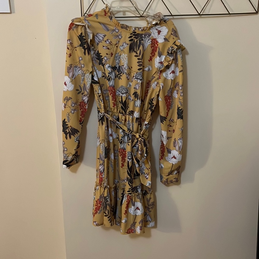 Women’s yellow floral long sleeve dress. Size large. Offers welcome.